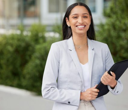 Business, corporate and finance woman worker with a happy smile outdoor on a work break. Portrait o